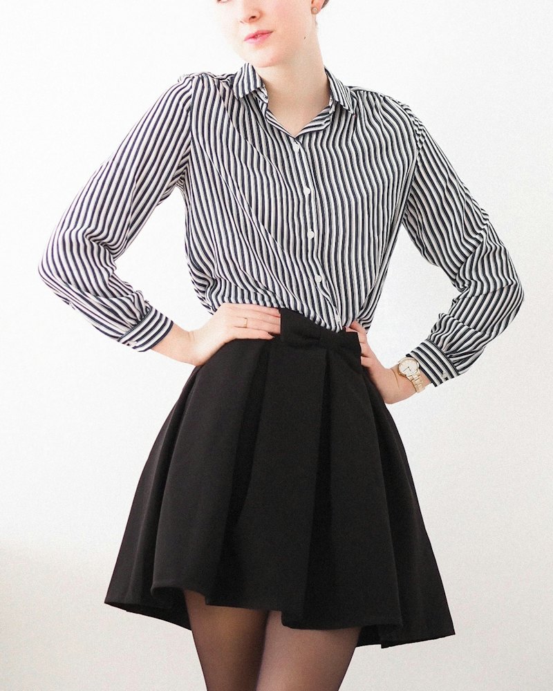 Pleated skirt — Black (women)